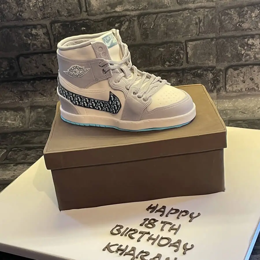 Birthday cake in the form of a Nike shoe.