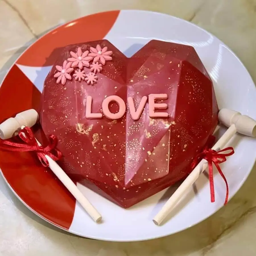 Red heart shaped Mendhi Cake.